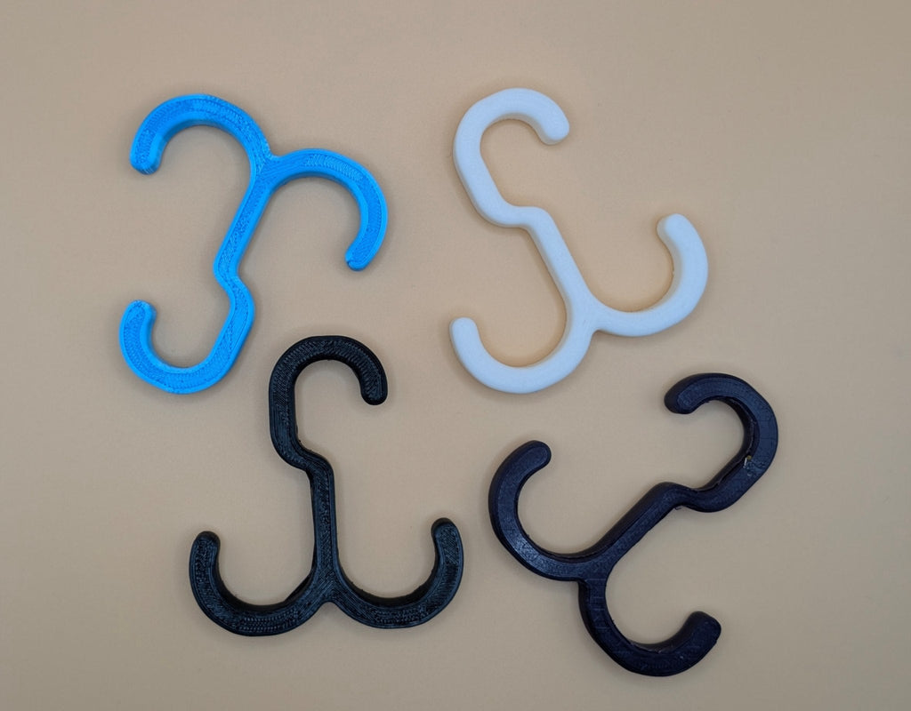 Daugiafunkcinis S formos kabliukas – tvirtas ir kompaktiškas