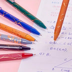 0,7 mm mėlyni geliniai rašikliai su auksine tekstūruota korpuso danga, skirti mokymuisi ir biuro darbui.