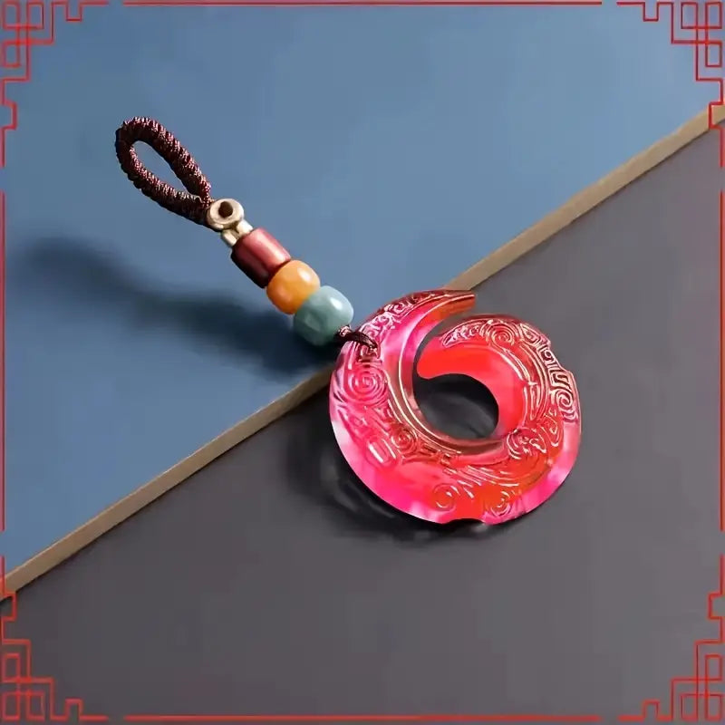 1 vnt. temperatūrai jautrus spalvą keičiantis raktų pakabukas, talismanas.