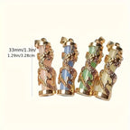 Švytintys tamsoje drakono formos pakabukai su daugiaspalviais dervos akmenimis ir aukso spalvos lydinio elementais.