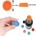 Orange bottle cap with measurements and a hand holding a blue bottle cap, showing various colored bottle caps on a white background.